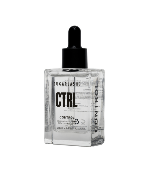 A bottle of Control Eyelash Glue Accelerator on a white background.