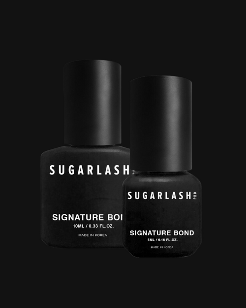 A 5ml and 10ml bottle of lash extension glue.