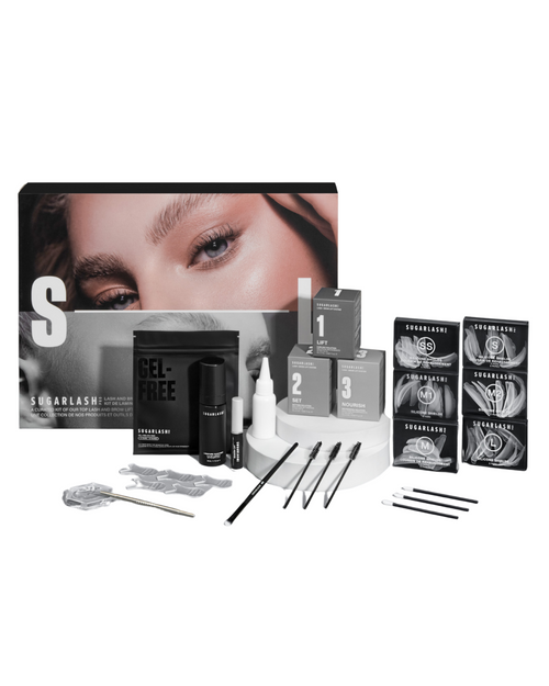 Lash and Brow Kit Box with included products displayed around it.