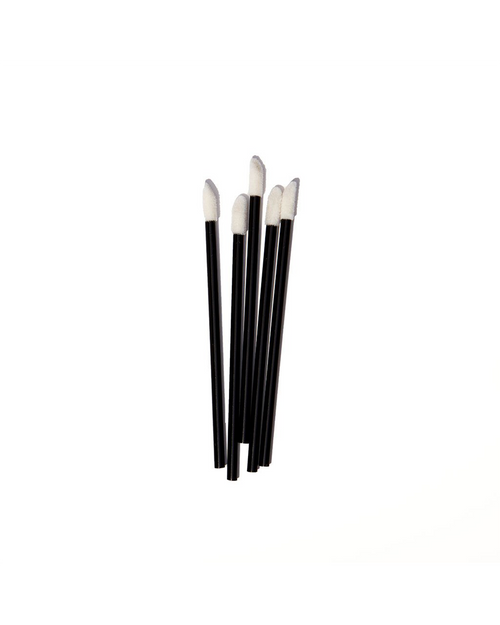 Multiple Flocked Lash Extensions Applicators against a white background.