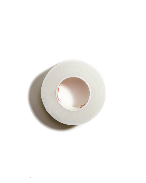 Roll of plastic skin safe tape for eyelash extensions.