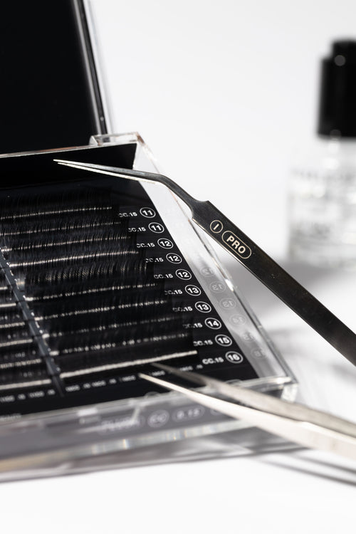 I-PRO eyelash extensions Isolation Tweezer in a lash tray.