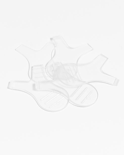 Multiple professional lash extensions lift Y Tools for lash lifts piled together on a white background.