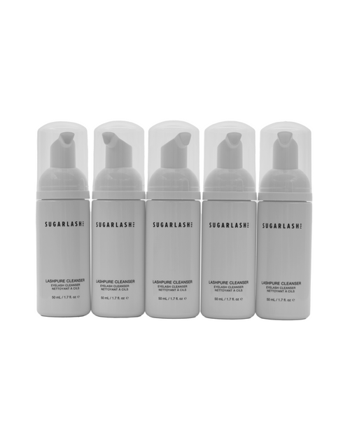 Multiple bottles of LashPURE cleanser for eyelash extensions.