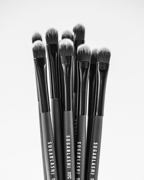 Close up of lash cleansing brushes.
